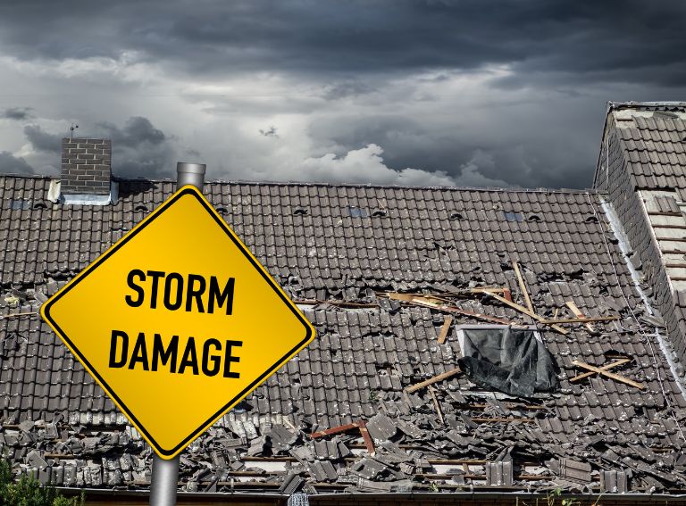 a roof severely damaged by a storm
